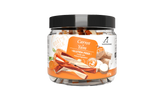 Jar of carrot yam dog treats with a black lid on a white background