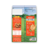 Purina Friskies adult pet food packaging with a grassy field background