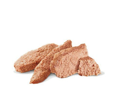 Three brown dog treats on a white background