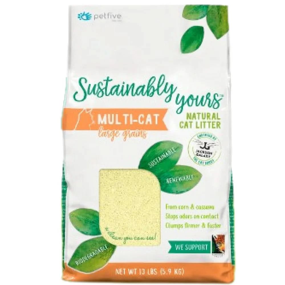Bag of sustainably sourced cat litter with green leaves on a white background