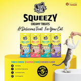 Top Cat Squeezy creamy treats packaging with a cat reaching for a treat on a yellow background