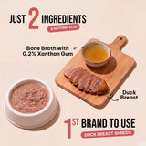 Adult cat enjoying real duck breast in bone broth from Zoomies Wet Stuff Lite