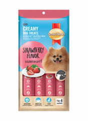 Packaging of PCO Creamy Dog Treats with strawberry flavor, featuring a dog illustration on a white background.