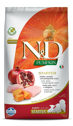 A package of Farmina N&D Puppy Pumpkin Chicken & Pomegranate Grain Free Dry Food for puppy starter. The bag is predominantly orange and white, featuring images of chicken, pumpkin, and pomegranate.