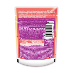 Back view of a food product packaging with text and a barcode on a white background