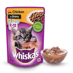 Whiskas kitten food pouch with a bowl of cat food on a white background