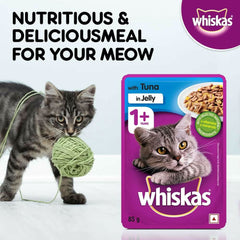 Whiskas cat food package with a kitten playing with a yarn ball on a white background