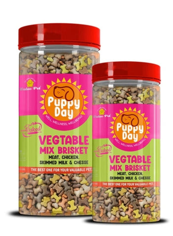 Two jars of 'Puppy Day' vegetable mix brisket dog food on a white background