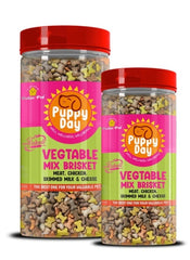 Two jars of 'Puppy Day' vegetable mix brisket dog food on a white background