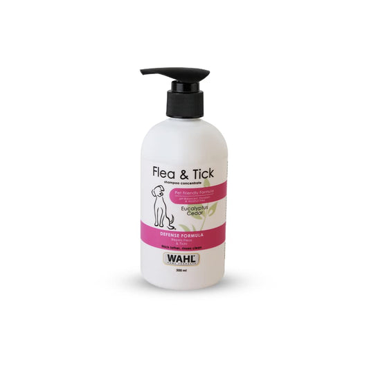 Wahl Flea & Tick shampoo bottle on a white background