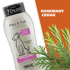 Wahl Flea & Tick shampoo concentrate bottle with rosemary and cedar elements on an orange background