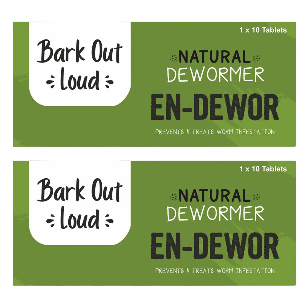 Two packages of En-Dewor natural dewormer for dogs on a white background.