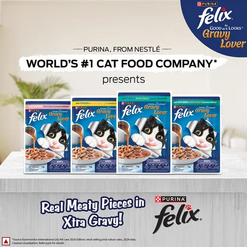 Felix cat food packages on a table with branding and product information.