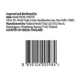Product label with import and distribution information and a barcode on a white background