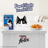 Purina Felix cat food packaging with a cat illustration on a white surface.
