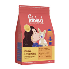 Fabled dog food package with a woman and dog illustration on a white background