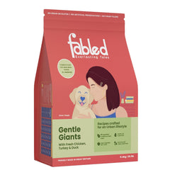 Fabled dog food package with a woman and dog illustration on a white background