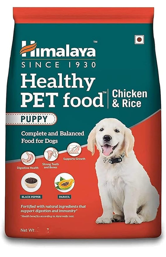 Himalaya Healthy Pet Food Puppy Chicken & Rice package with a dog on the label.