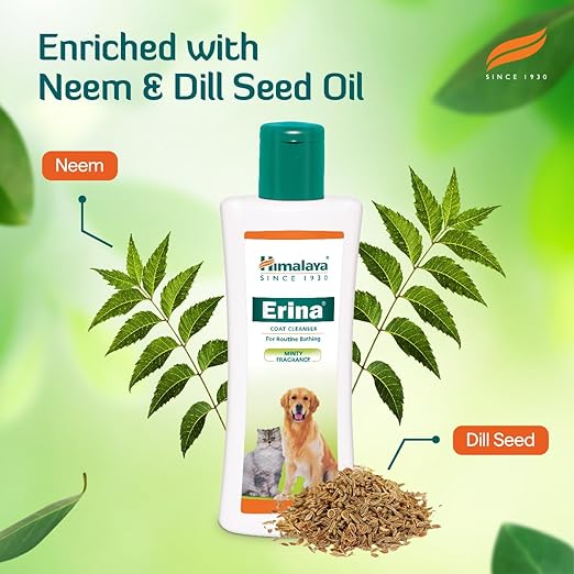 Himalaya Erina coat cleaner bottle with neem and dill seed oil on a green background