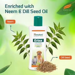 Himalaya Erina coat cleaner bottle with neem and dill seed oil on a green background