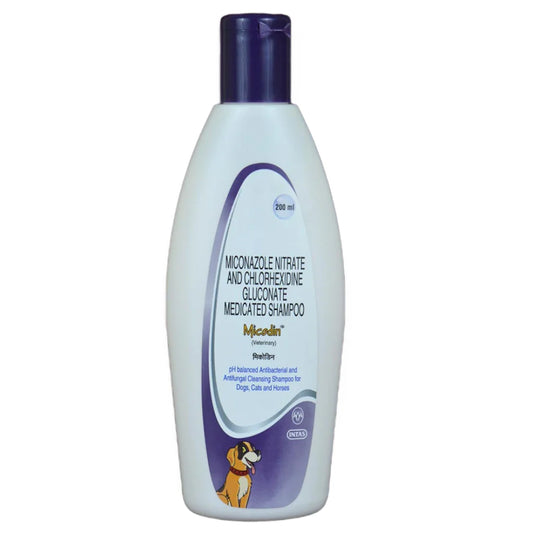 Bottle of Miconazole Nitrate and Chlorhexidine Gluconate Medicated Shampoo on a white background
