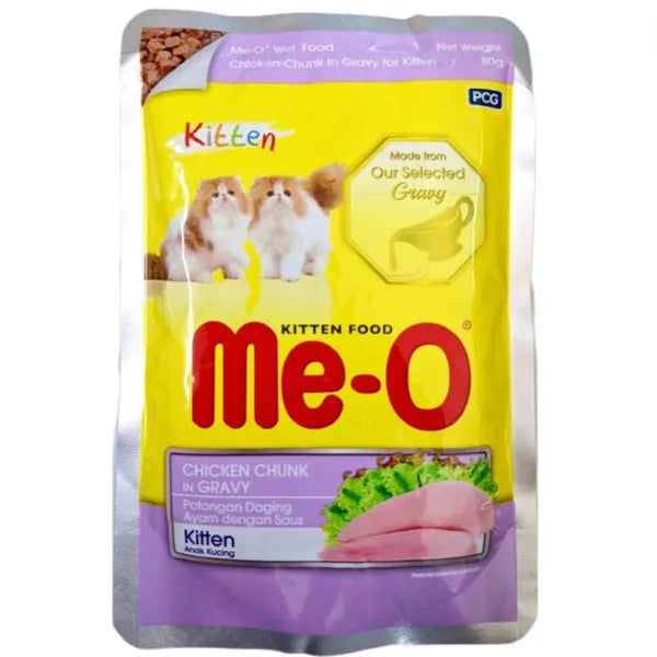 Me-O kitten food package with chicken chunk in gravy on a white background