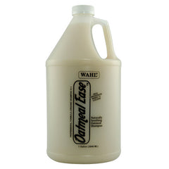 Gallon bottle of Wahl Oatmeal Ease shampoo on a white background