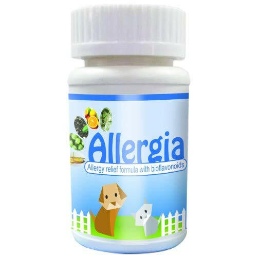 A bottle of Vetina Allergia supplement for pets, with a label featuring a cartoon image of a dog and a cat.