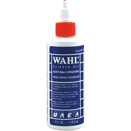Wahl clipper oil bottle with blue label and red cap on a white background