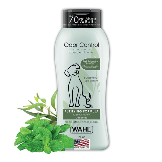Wahl Odor Control shampoo concentrate bottle with eucalyptus and spearmint leaves on a white background
