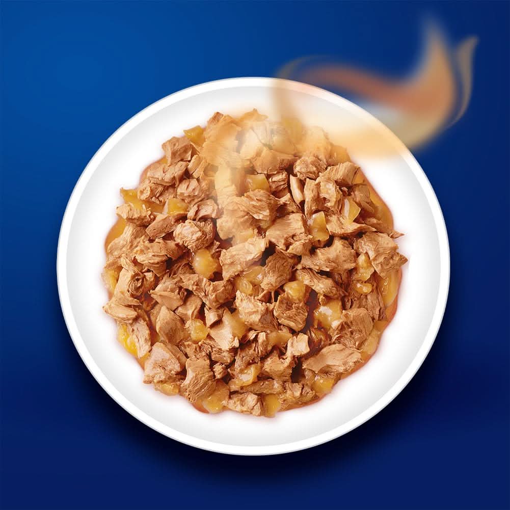 White bowl of food with flames on a blue background