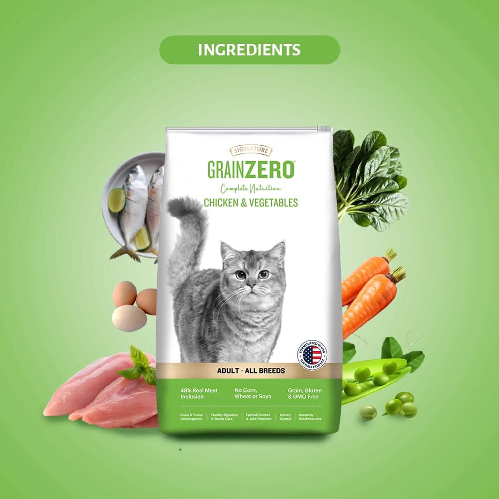 GrainZero cat food package with a cat on the label, surrounded by ingredients like carrots, fish, and vegetables on a green background.