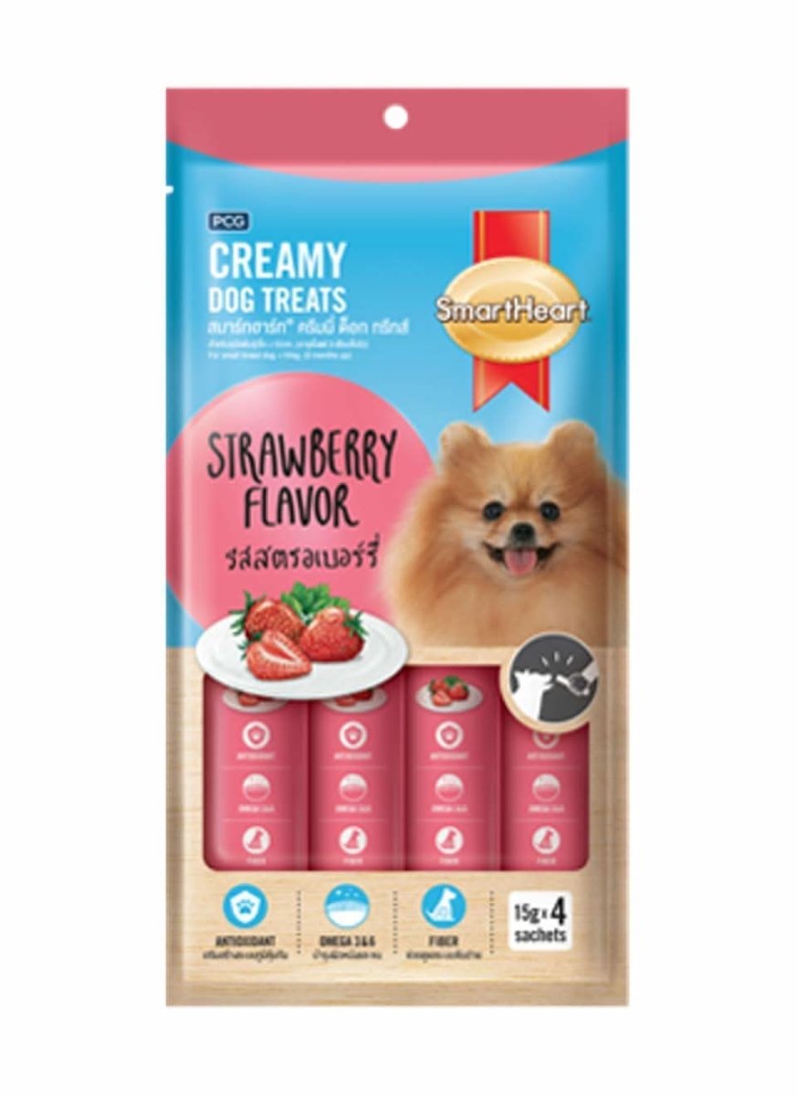 Packaging of PCO Creamy Dog Treats with strawberry flavor, featuring a dog illustration on a white background.