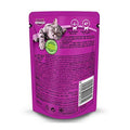 Purple Whiskas cat food pouch on a white background
