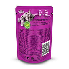 Purple Whiskas cat food pouch on a white background