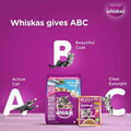 Whiskas cat food packaging with promotional text on a purple background