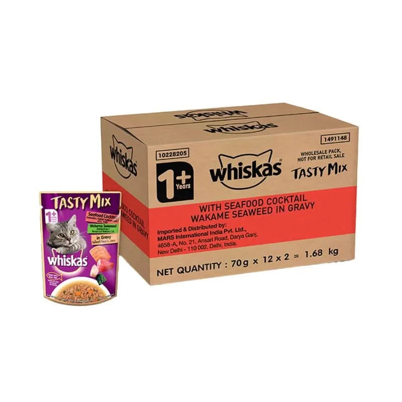 Box of Whiskas Tasty Mix cat food with a single pouch on a white background