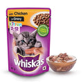 Whiskas kitten food pouch with a bowl of cat food on a white background